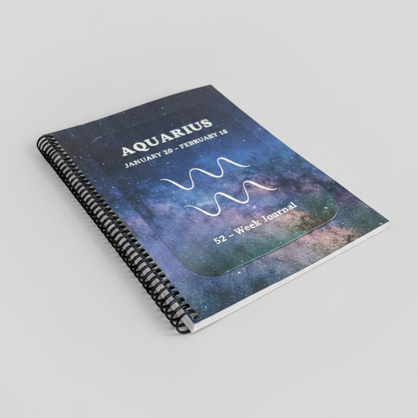 Aquarius 52-Week Zodiac Journal with plain light grey studio background