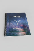 Aries 52-Week Zodiac Spiral-Bound Journal with a grey studio background.