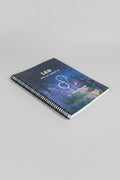 Leo 52-Week Zodiac Spiral-Bound Journal with a grey studio background